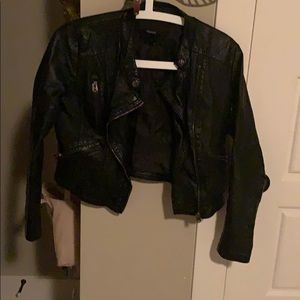 Leather jacket black, has a hole, not big.